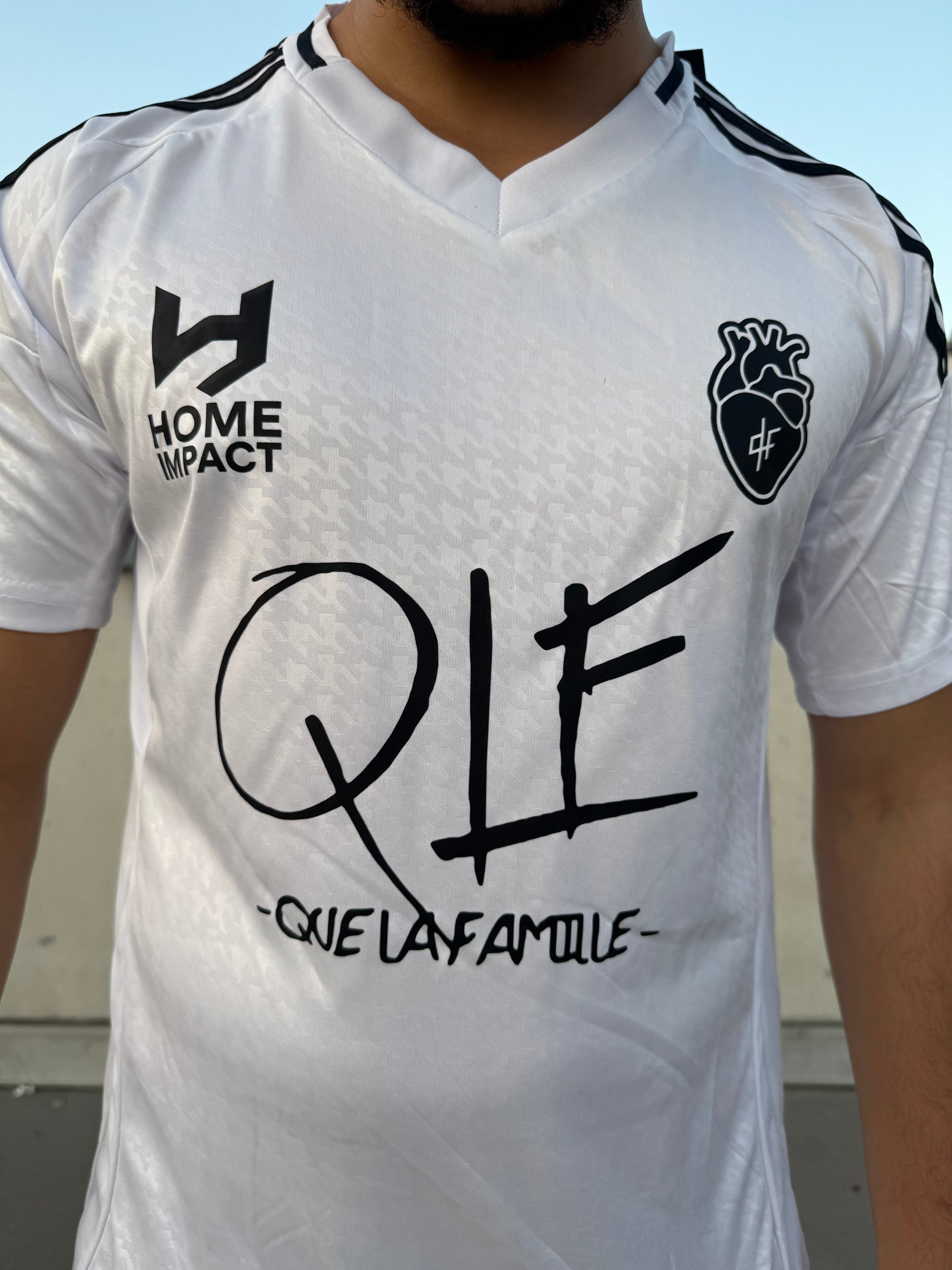 Maillot Home Impact Que La Famille Blanc Noir