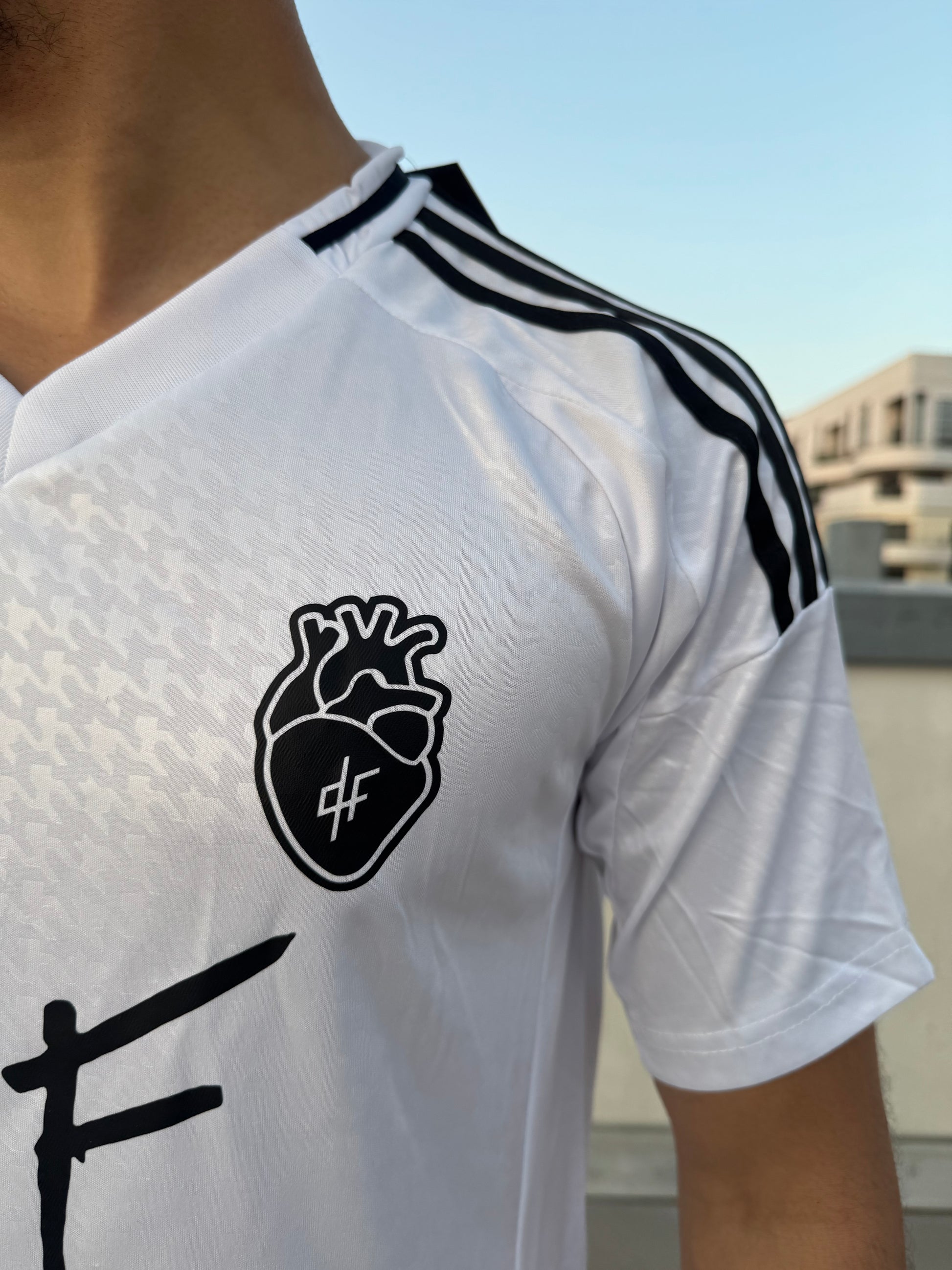 Maillot Home Impact Que La Famille Blanc Noir
